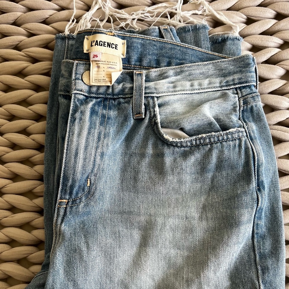 L’Agence mid rise distressed jeans